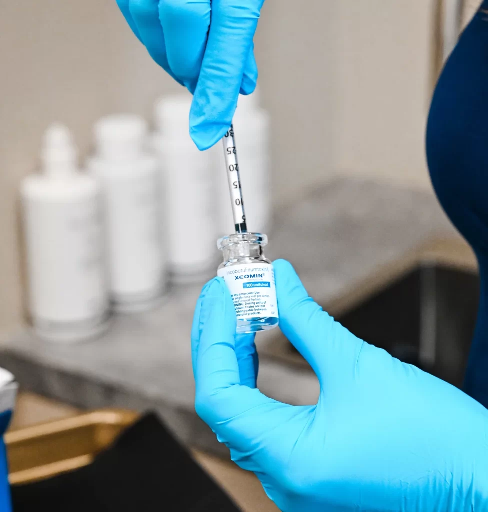 Provider drawing up Xeomin neurotoxin from a vial