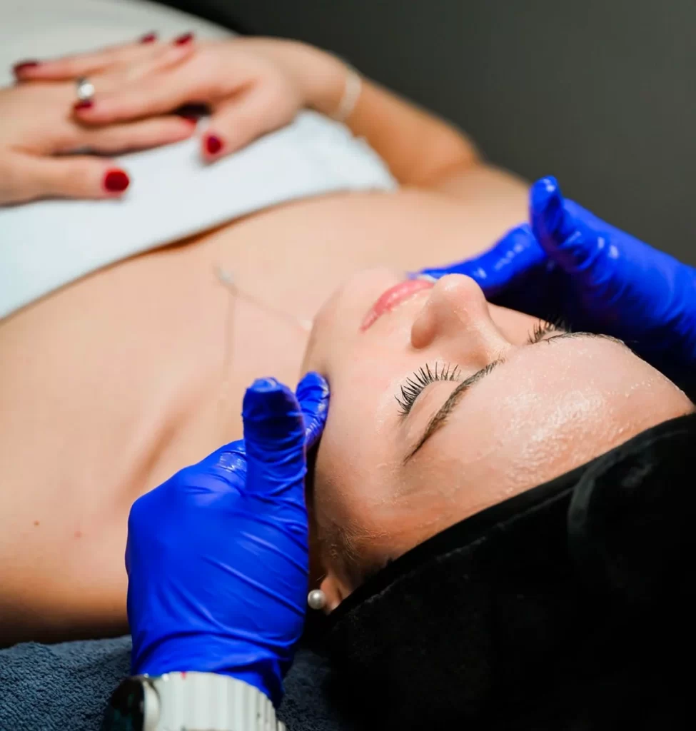 Provider performing a relaxing signature facial