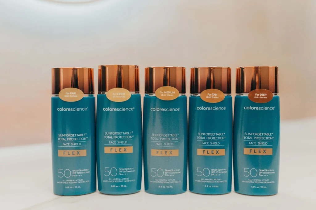 Colorescience tinted sunscreen bottles lined up for color matching